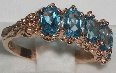 Rose Gold Natural Blue Topaz Womens Eternity Ring - Full 10ct Gold UK Hallmark Carousel 2