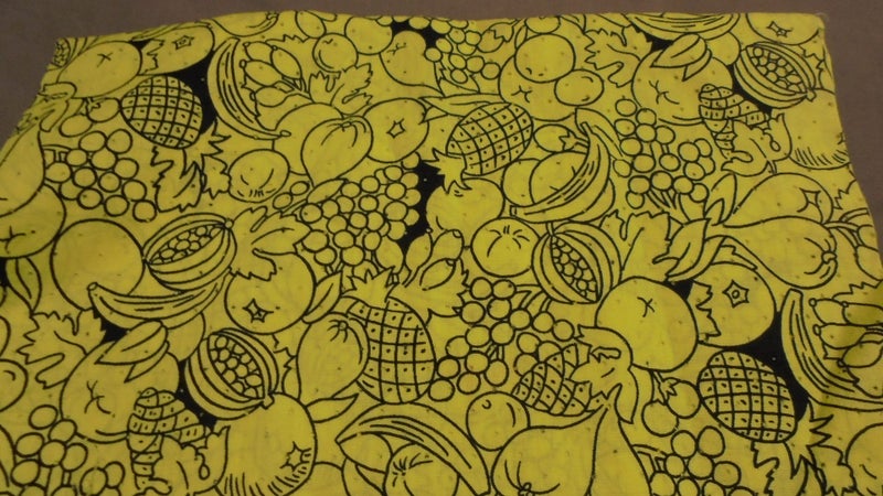 Yellow with Black fruit cotton I think 110 cm x 0.5 m as shown Carousel 1