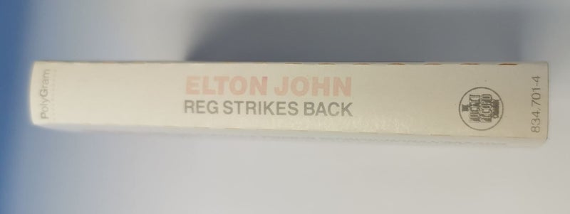 ELTON JOHN - REG STRIKES BACK (CASSETTE) Carousel 1