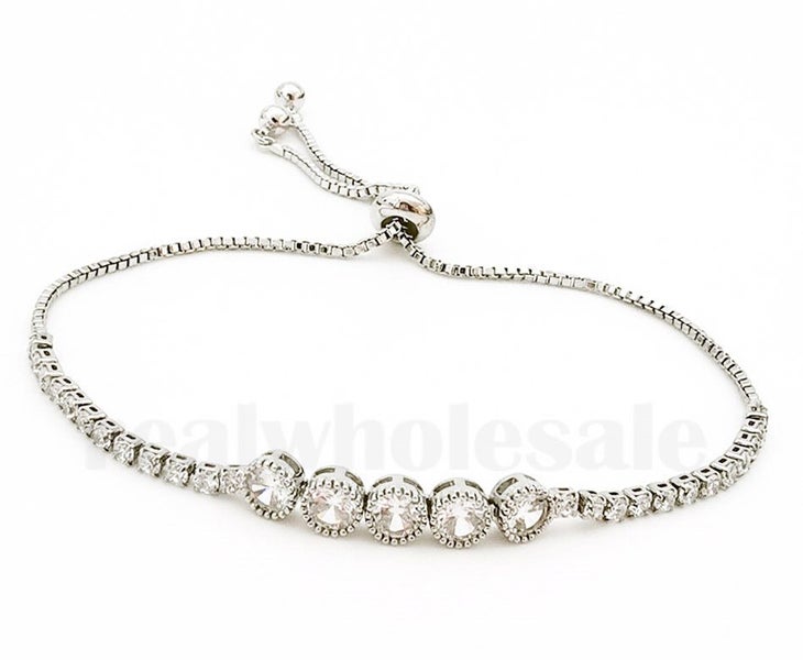 CZ Diamonds Bracelet / 18KGP White Gold Carousel 1