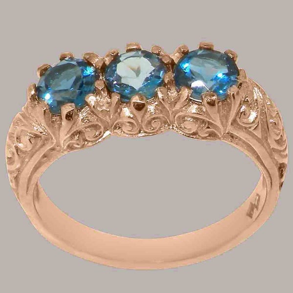 Rose Gold Natural London Blue Topaz Womens Trilogy Ring - Full Gold UK Hallmark Carousel 1