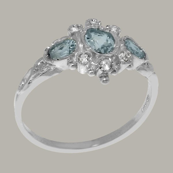 White Gold Natural Aquamarine Cubic Zirconia Trilogy Ring - Full UK Hallmark Carousel 1