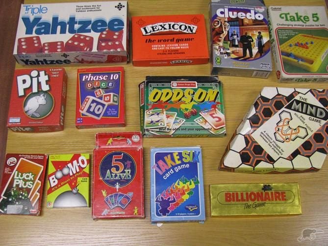 Compendium of games - including games like Snakes & Ladders, Chess, checkers@@@ Carousel 2