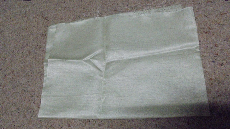 Cream/pale yellow Chintz Curtain sample as shown Carousel 1