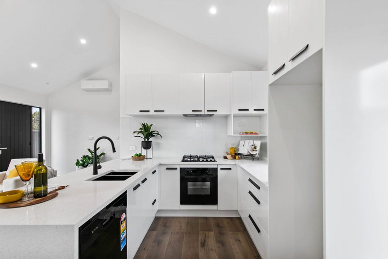 U-Shaped Kitchen in Black & White Style, with Stone Waterfall Carousel 1