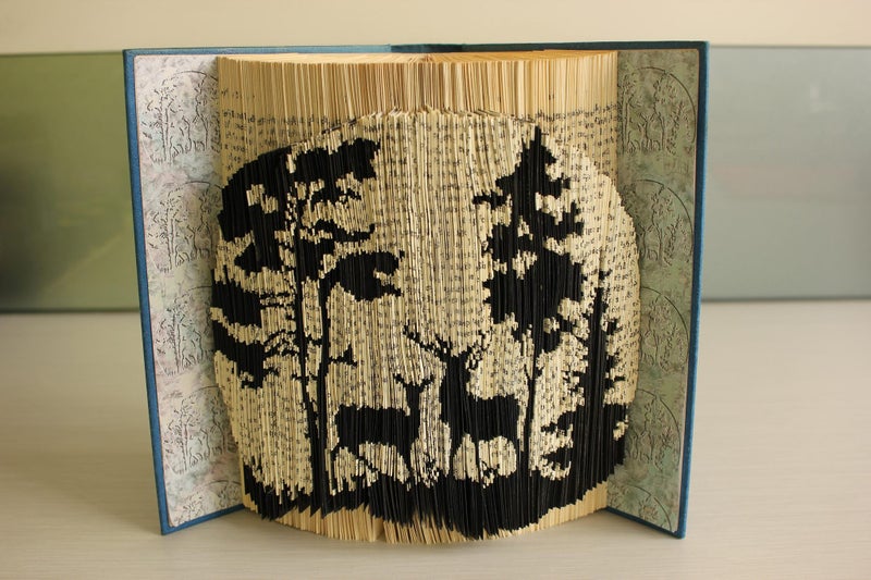 Deer in moon light: Drawing carved in book. One-of-a-kind Handmade Art sculpture Carousel 1