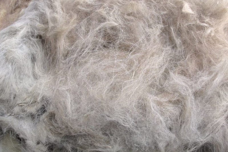 Llama Fleece #9, 1kg. Appaloosa blend of greys and caramel brown Carousel 1