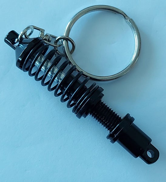 Shock Absorber Themed Key Ring Carousel 1
