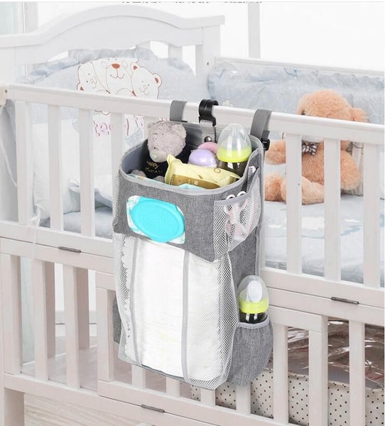 Baby Crib Cot Bed Storage Hanging Pocket Diaper Nappy Clothes Organizer Carousel 1