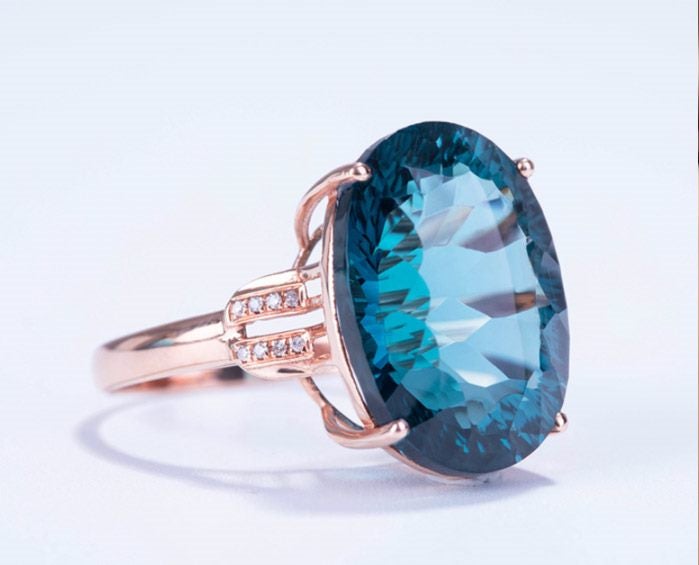 Oval Cut Blue Cubic Zirconia Ring / Rose Gold Plated Carousel 1