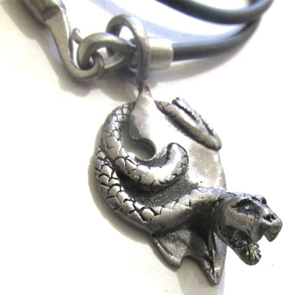 Pewter snake design on black cord, 40cm long. Carousel 1