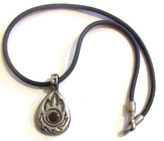 Pewter flames design on black cord, 40cm long. Carousel 2