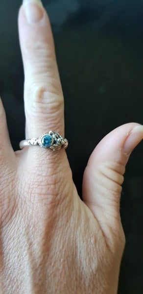Sea Blue Topaz set Silver Floral Ring Carousel 1