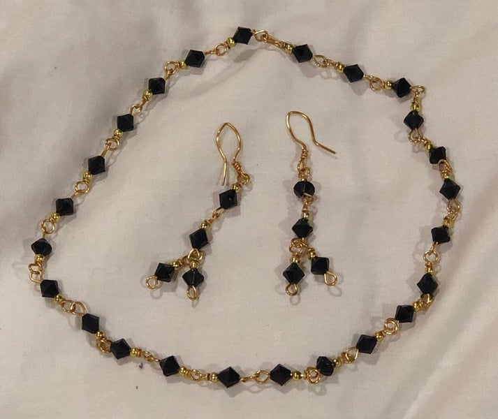 Brand New Necklace & Earrings Set - Black Carousel 1