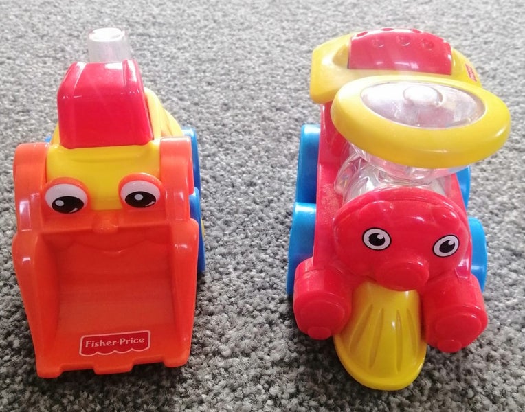 Fisher Price Poppity Pop Train and Bright Beginnings Happy Bulldozer Carousel 1