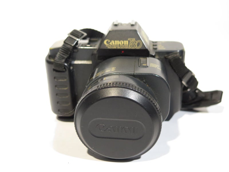 Canon T80 Single Lens Reflex 35mm Film Camera + 35-70mm lens + flash Carousel 2