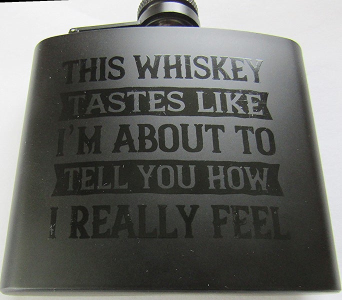 5oz Hip Flask in matt black with hinged lid, 'This Whiskey tastes like..' design Carousel 1