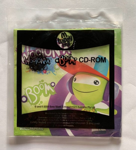 2010 Wootonia - BOOM - CD-ROM - McDonalds Happy Meal Toy (New in Bag) Carousel 1