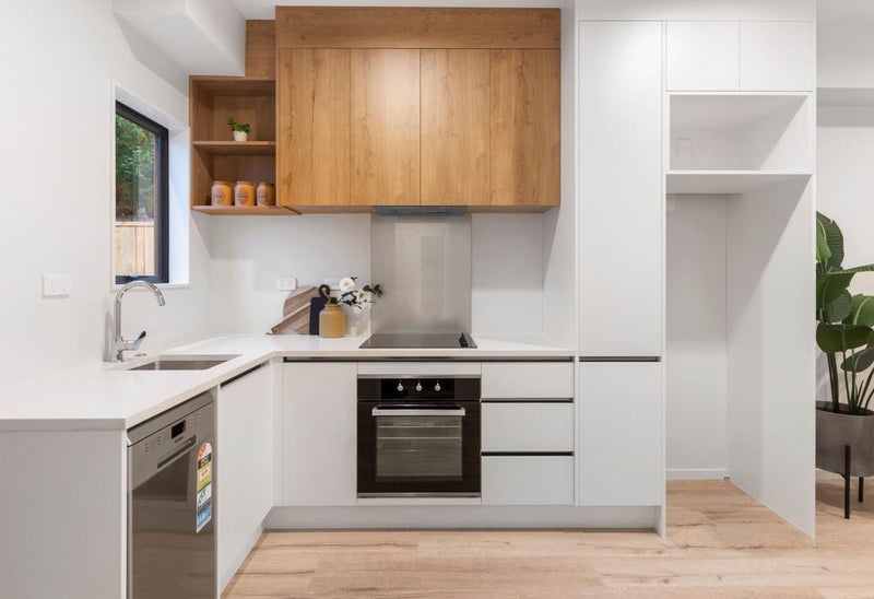 Modern kitchen with recess handles and stone benchtop Carousel 1