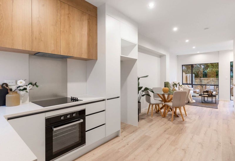 Modern kitchen with recess handles and stone benchtop Carousel 2