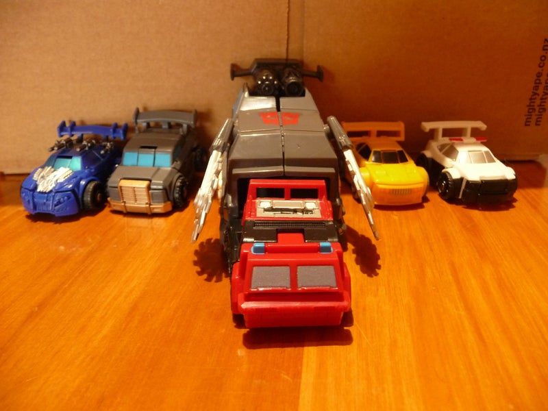 Transformer Bot Shots Sentinel Prime Prowl Bumblebee Iron Hide +Launcher-Topspin Carousel 1