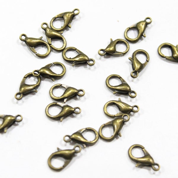20pc Antique Bronze Lobster Clasps Carousel 1