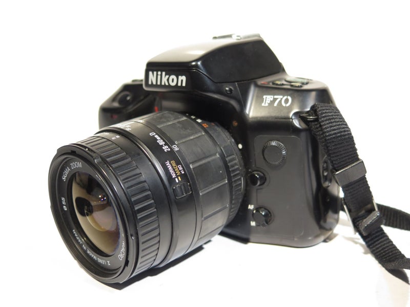 NIkon F70 35mm film SLR camera with 28-80mm lens Carousel 1
