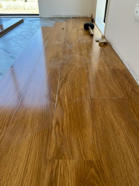 12mm OAK GLOSS ON SPECIAL $29.95/m2 incl gst & underlay - Laminate flooring Carousel 2