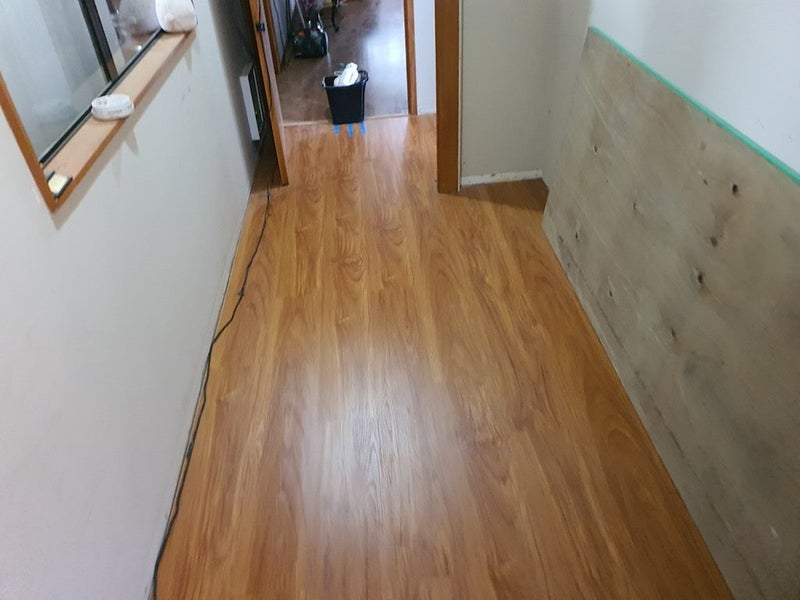 8mm Laminate flooring $16.95/m2incl gst - Cherry Oak Carousel 2