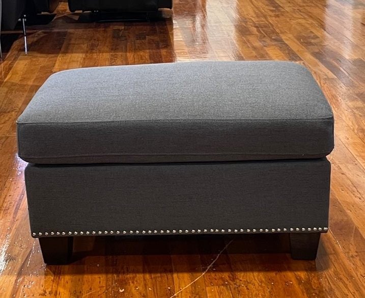 Rhea Ottoman in dark grey fabric Carousel 1