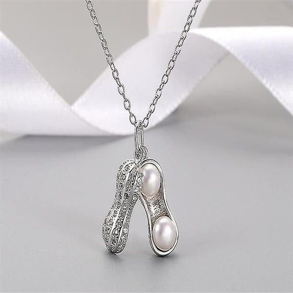 Natural Freshwater Pearls Peanut Pendant Necklace Fine Jewelry Gold And Silver Carousel 1