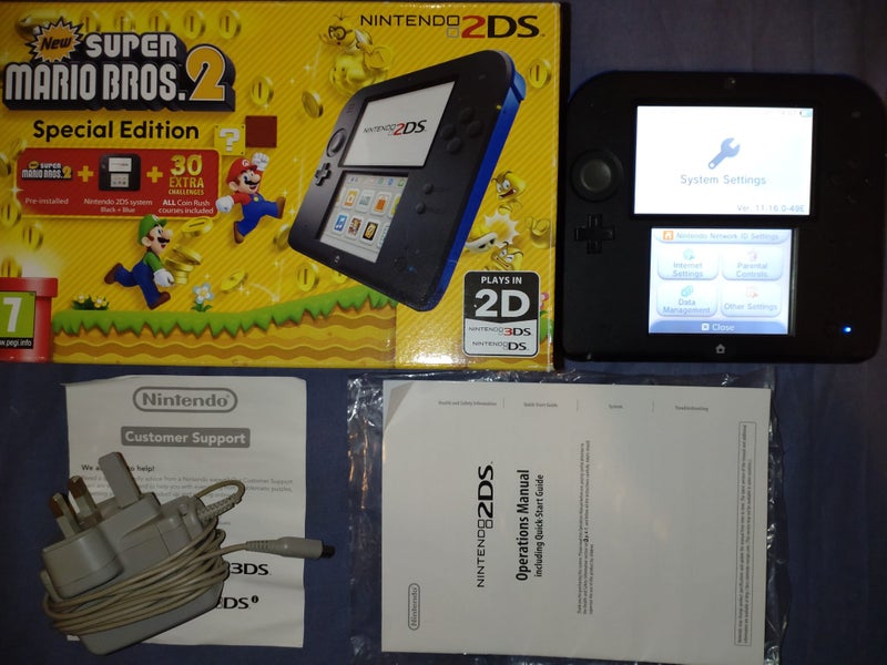 *Boxed Nintendo 2DS Console (New Super Mario Bros 2 Ed) + 7 Games* Carousel 1