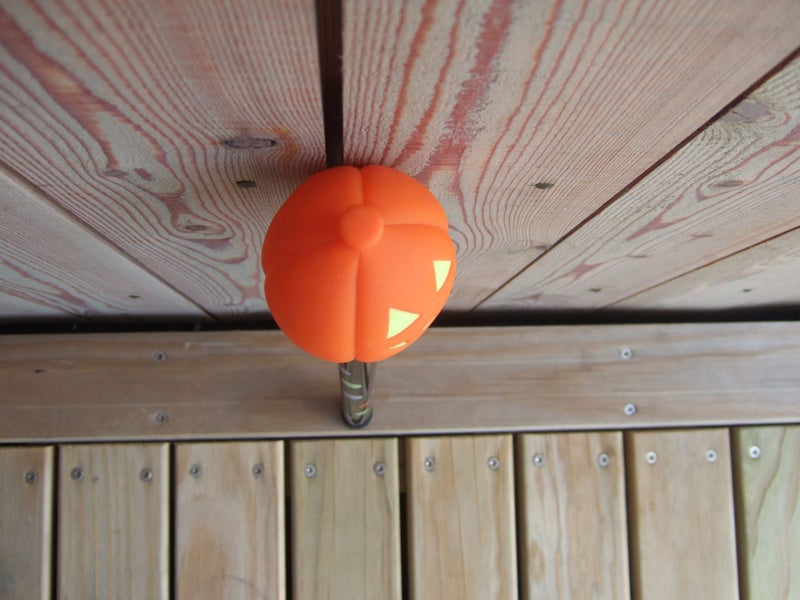 halloween jack o' lantern press me toy head on a coloured stick type handle Carousel 11