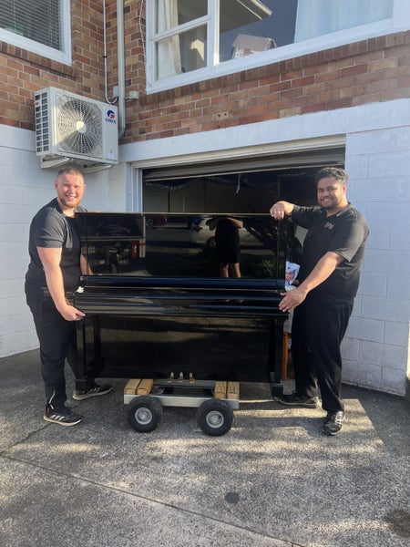 TWO MEN AND A TRUCK FURNITURE MOVERS Carousel 2