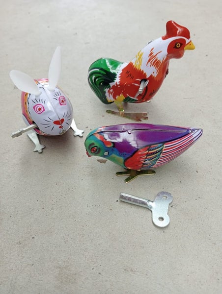 **COLLECTION OF VINTAGE REPRODUCTION TIN WIND UP TOYS** Carousel 2