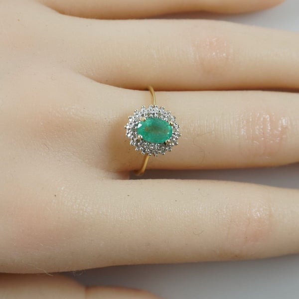 Elegant natural emerald & diamond halo ring in 9ct Carousel 8
