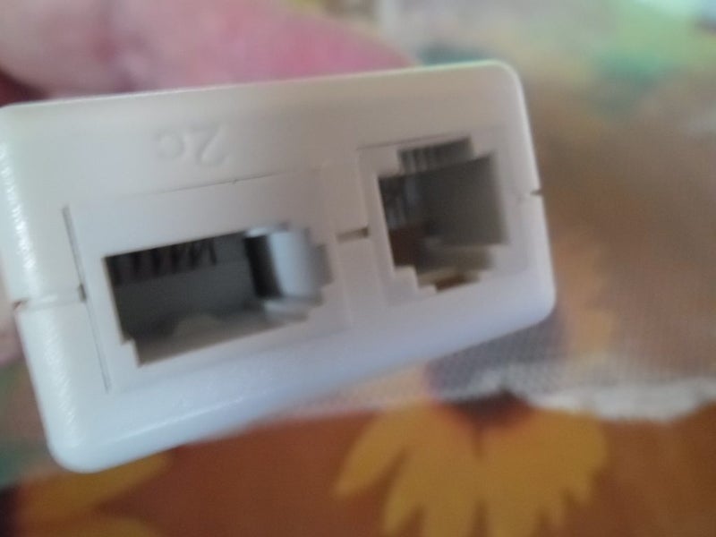 White Telephone Extension Adaptor Carousel 1