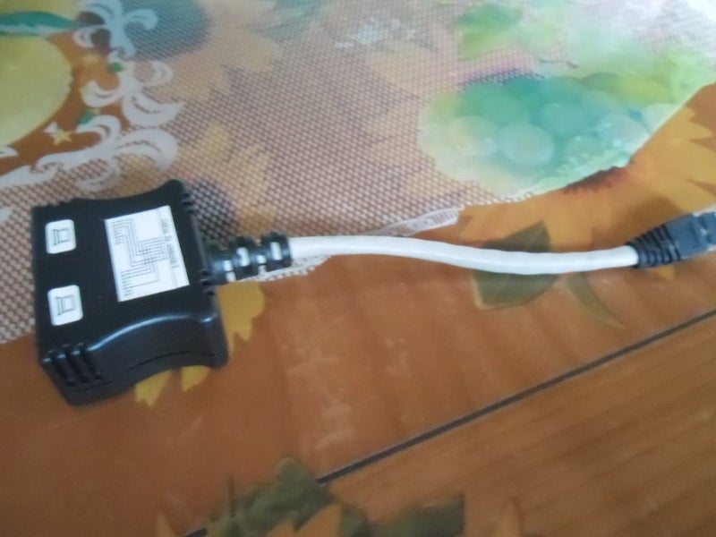 Black/White Telephone Extension Adaptor Carousel 1