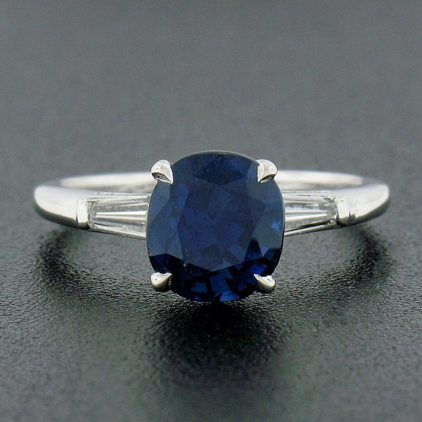 Vintage Platinum 2.85ctw Oval Sapphire and Baguette Diamond Engagement Ring Carousel 1