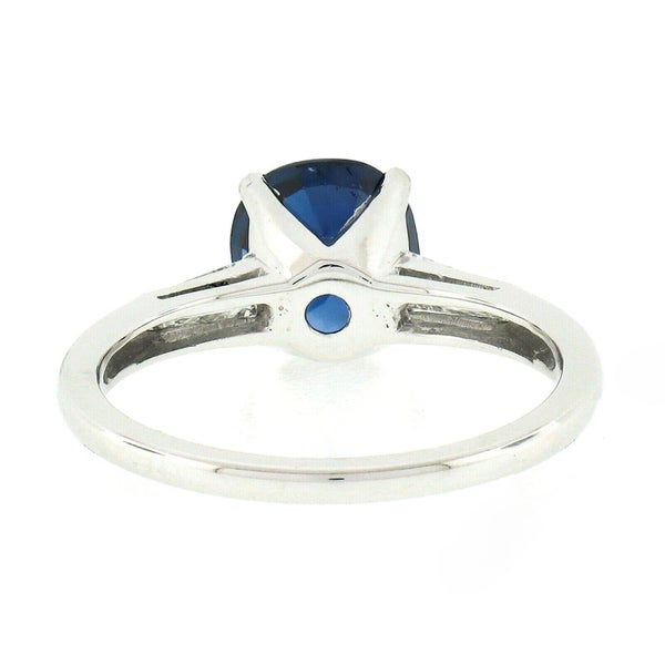 Vintage Platinum 2.85ctw Oval Sapphire and Baguette Diamond Engagement Ring Carousel 8