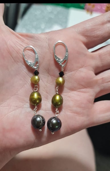 Hook earrings made of 925 sterling silver. Freshwater pearls Author's work New Carousel 1