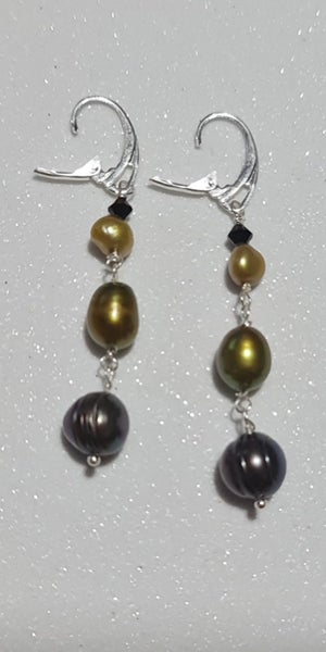 Hook earrings made of 925 sterling silver. Freshwater pearls Author's work New Carousel 2