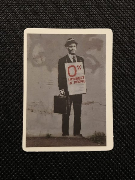 ** BANKSY ART ** 1 x Sticker - ‘0% Interest in People’ (5cm) Carousel 1