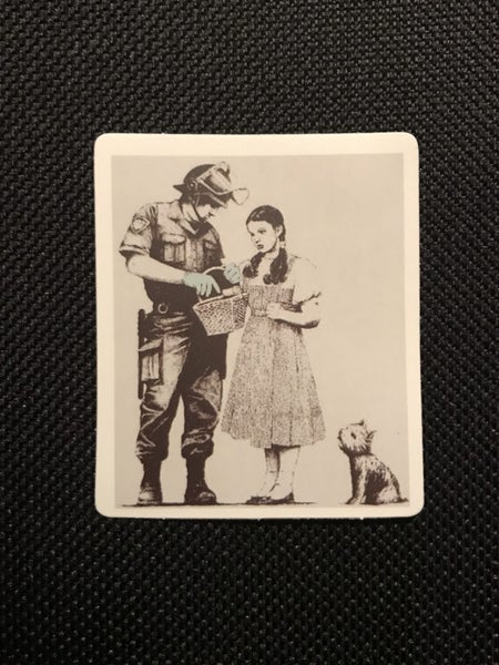 ** BANKSY ART ** 1 x Sticker - Dorothy & Toto getting searched (5cm) Carousel 1
