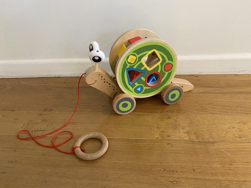 Hape Walk-A-Long Snail Carousel 1