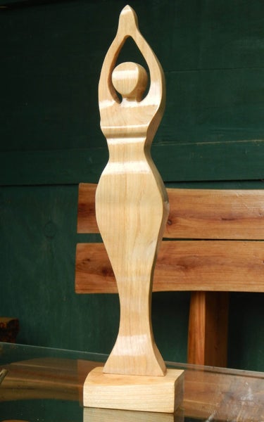 Candella - A Hand Carved Female Form Carousel 1