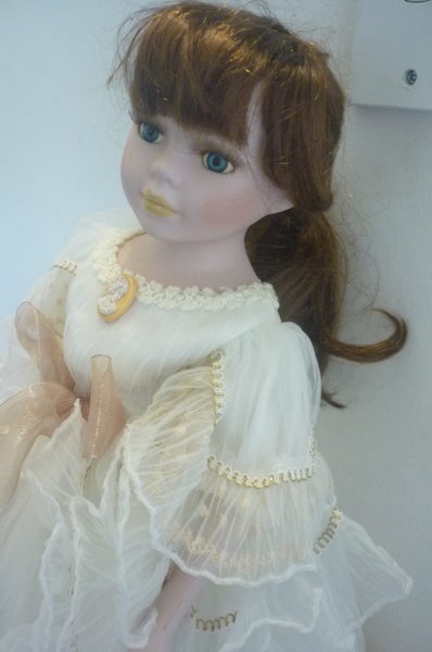 PORCELAIN DOLL Carousel 2