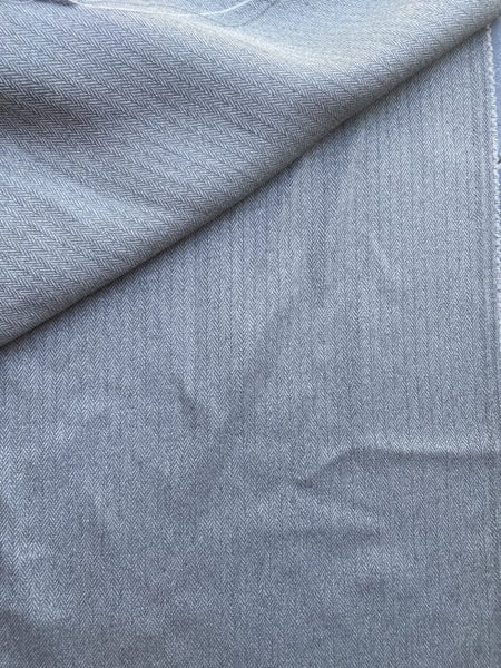 Grey herringbone fabric Carousel 1