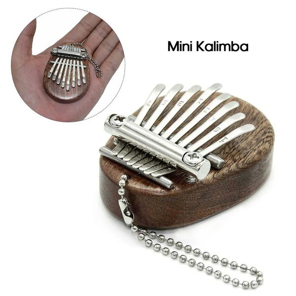 8 Key Mini Portable Thumb Piano Finger Percussion Keyboard Pocket Musical CHK29M Carousel 2