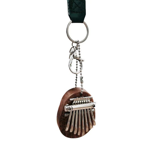 8 Key Mini Portable Thumb Piano Finger Percussion Keyboard Pocket Musical CHK29M Carousel 8